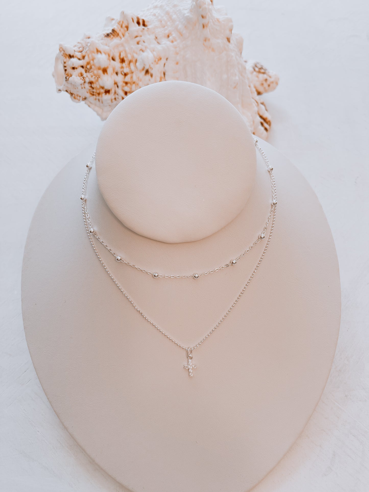 OroAmerigo 18” beaded adjustable Angelina necklace with 18” Pallini Rhodium chain and Angelina Petite cross.