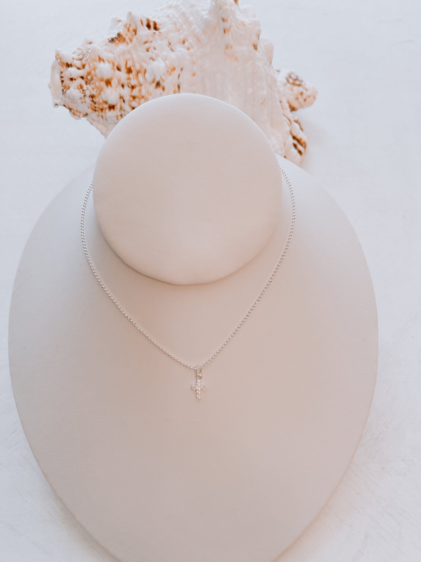 Angelina CZ Sterling Silver Cross on Pallini Rhodium Chain.