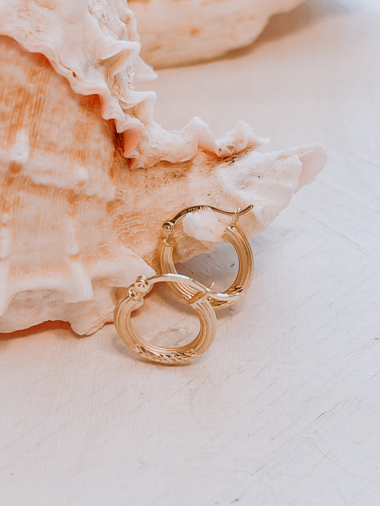 OroAmerigo petite satin and diamond cut hoop earrings.